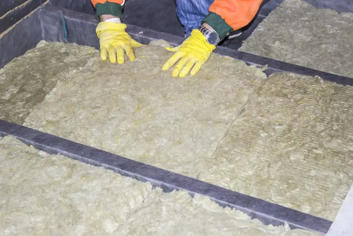 loft insulation being installed